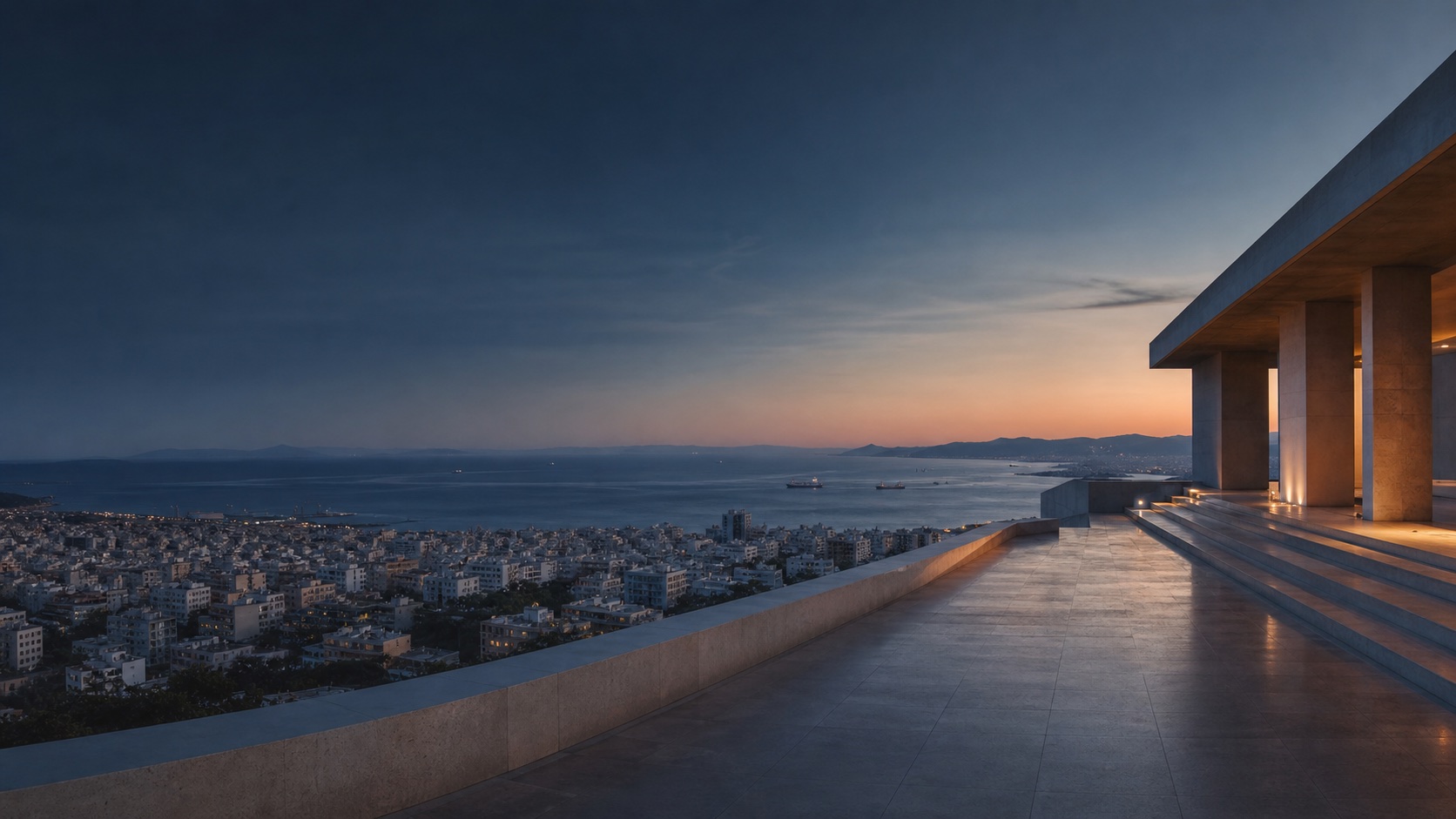 Athens and the Saronic Gulf at blue hour, viewed from a contemporary stone terrace